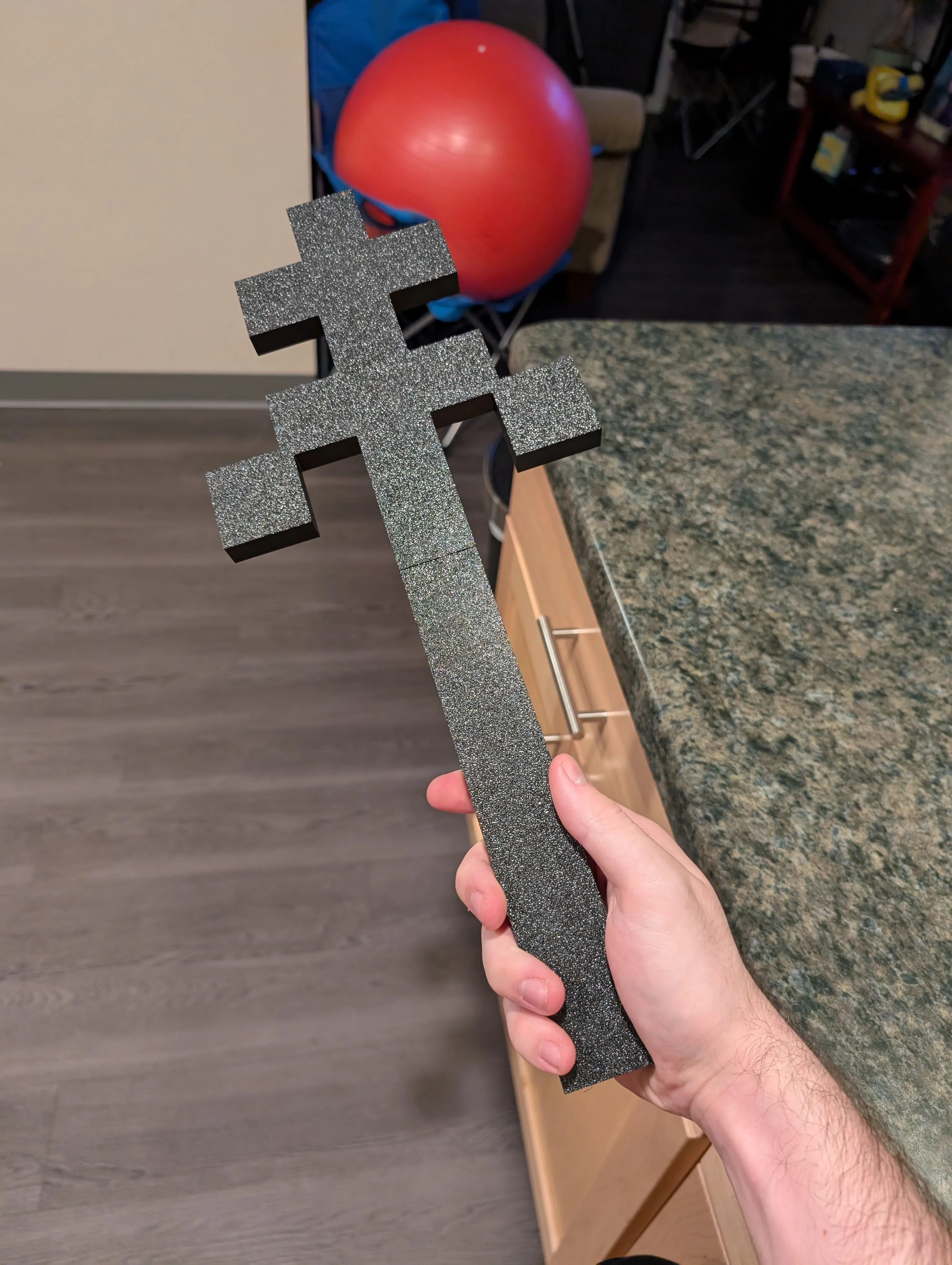 Holding the printed wand, attached