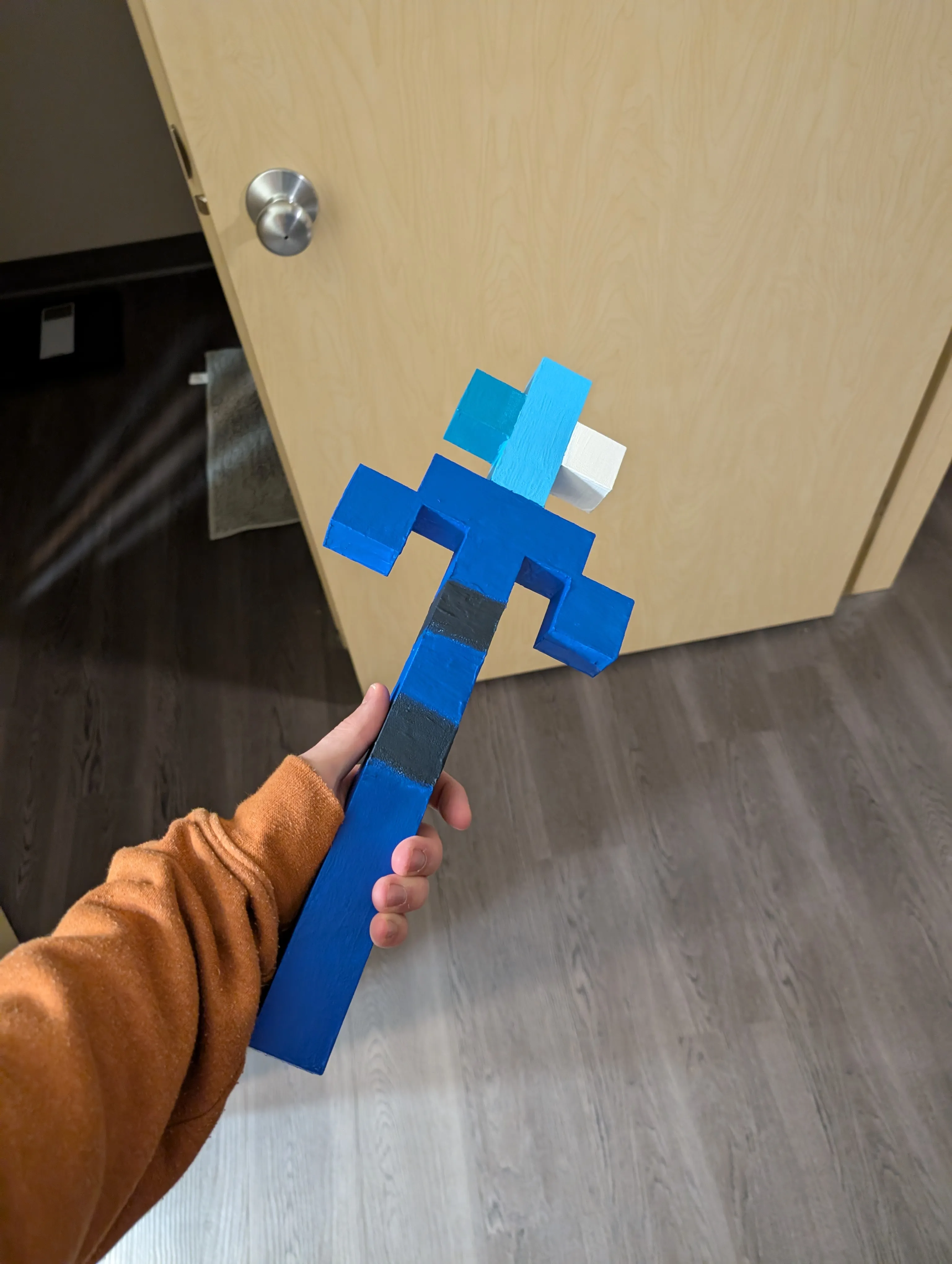 Wand, post-paint, held in hand